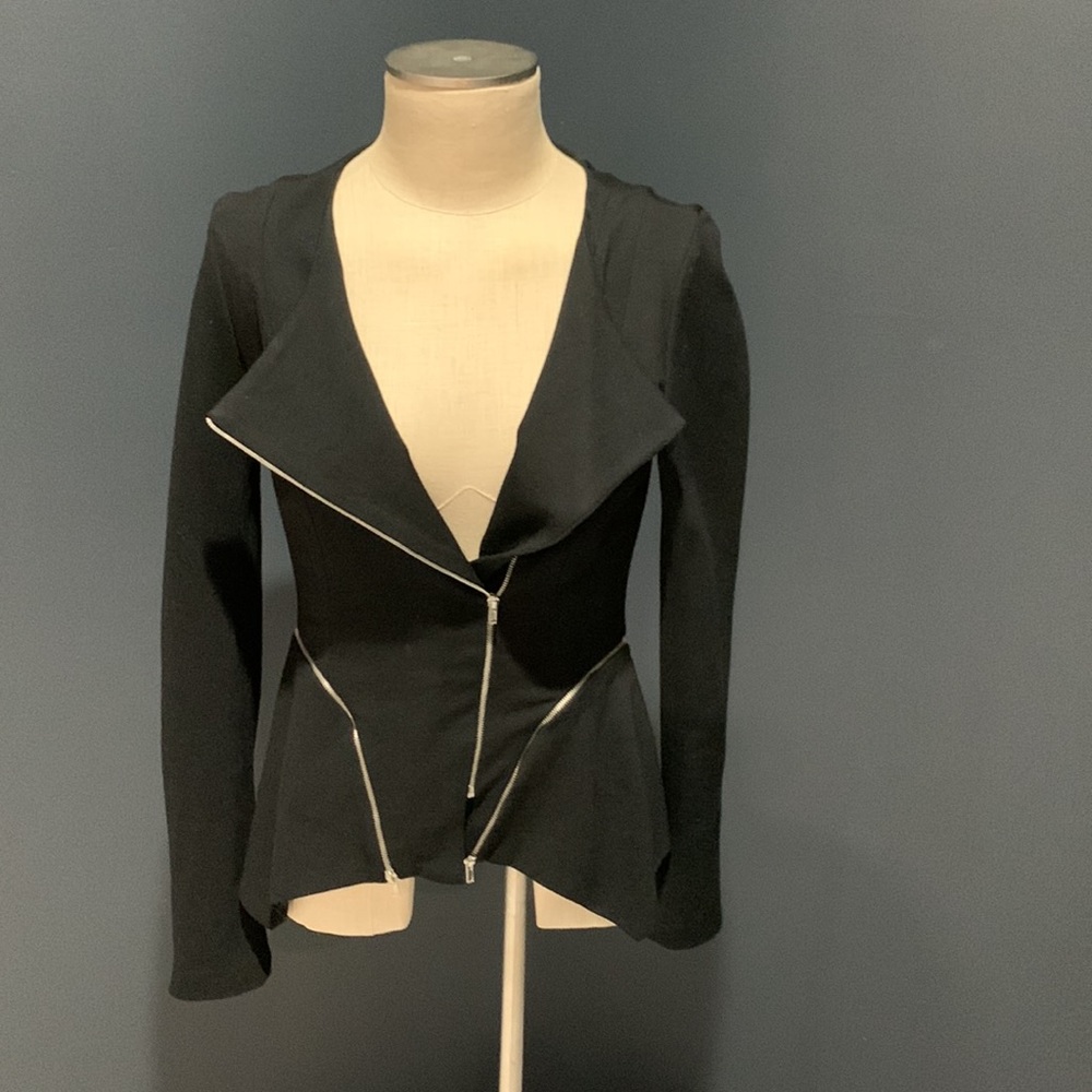 Zipper jacket by Ronny Kobo.